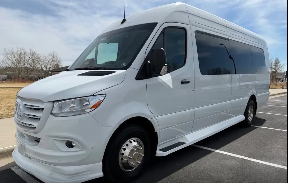 Pueblo 16 passenger white Sprinter limo bus