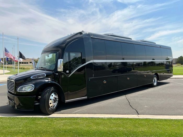 Black coach bus β Pueblo limo service